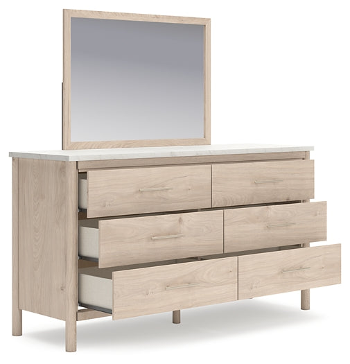 Cadmori Queen Upholstered Panel Bed with Mirrored Dresser